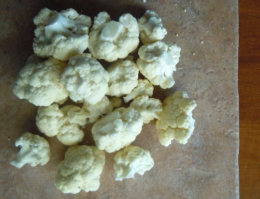 Prepared Cauliflower Florets for freezing in Blanching Vegetables.