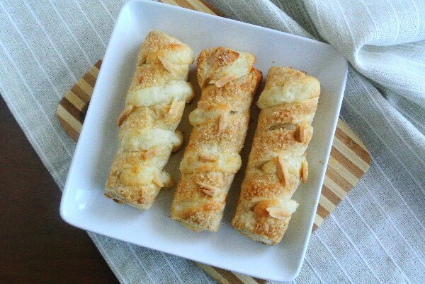 Three strudels on a square plate.