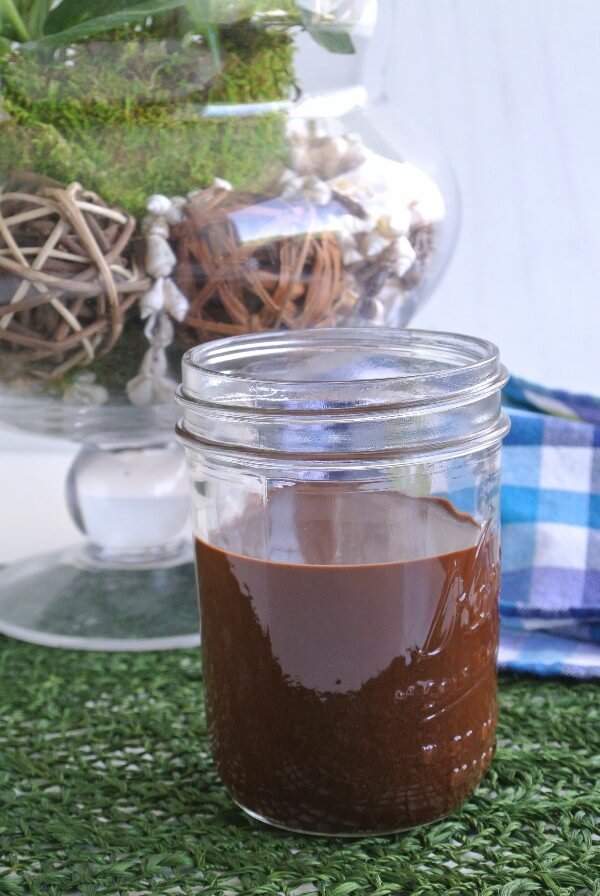 Chocolate Syrup is in a clear glass jar.