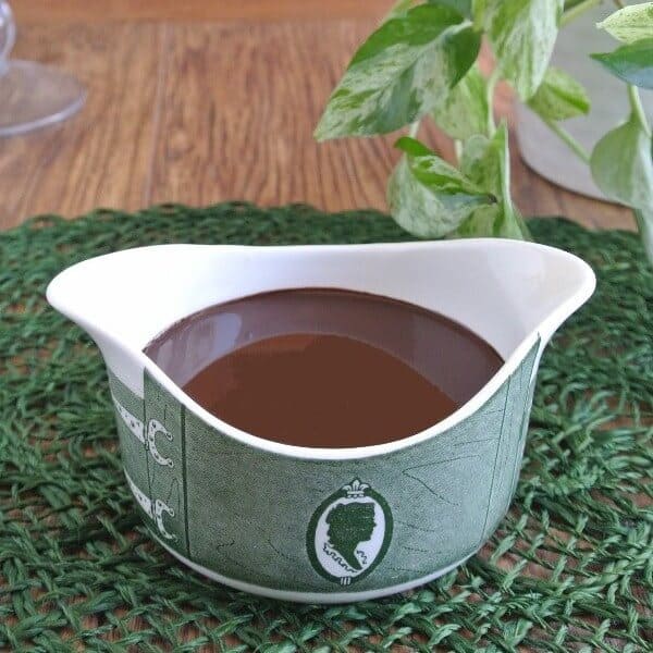 Chocolate in an antique green and white creamer.