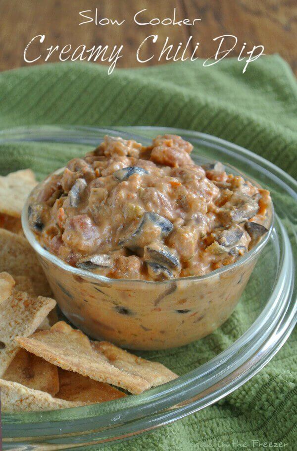 Slow Cooker Creamy Chili Dip is cooked in a crockpot and is done in a few short hours. Spicy good with fresh veggies and chips makes this a 5 star recipe.