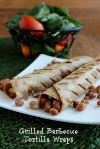 Grilled Barbecue Tortilla Wraps are lightly grilled with text below white plate.