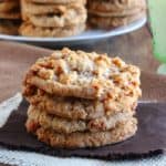 Stack of homemade fruity cookies on a brown napkin and beige burlap square. Pie Cookies may just be the perfect treat.