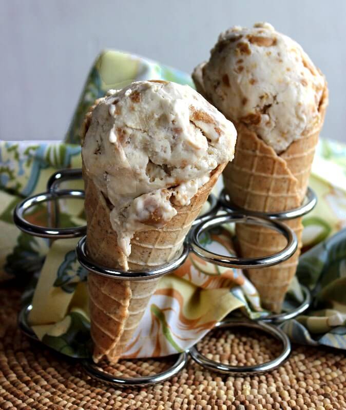 Ice cream cones Holding a huge scoop each of dairy free ice cream.