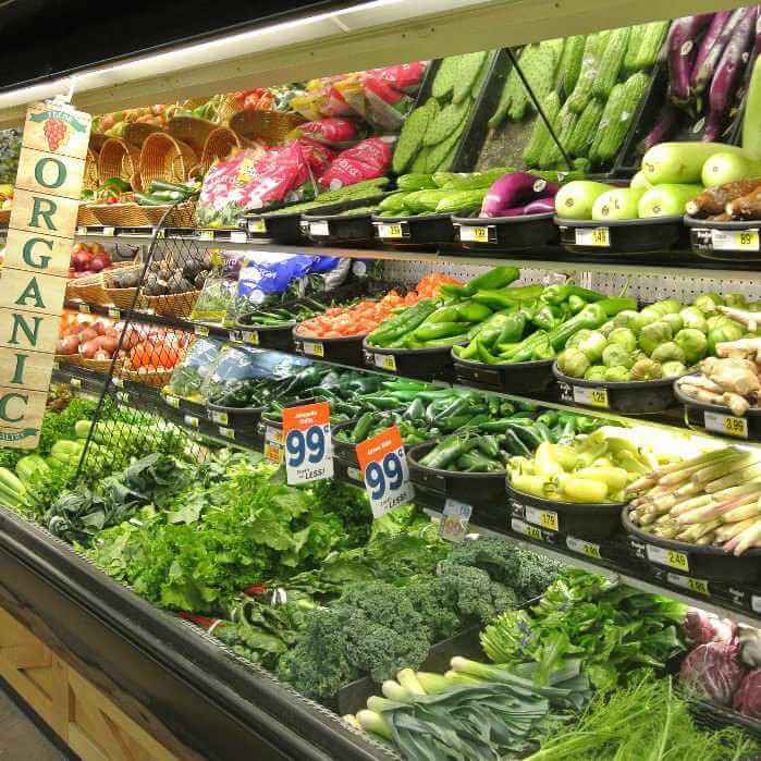 Vegan Grocery Shopping List is perfect to pick up any of the prodeuce from this photo. It's the organic aisle neatly piled in the colors of greens and oranges.