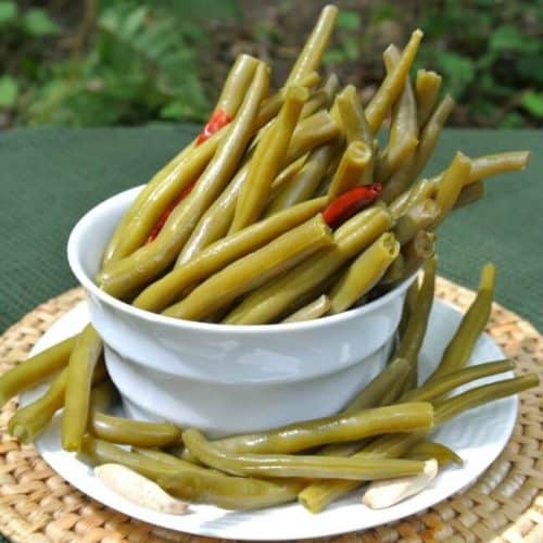 Spicy Pickled Green Beans are a wonderful way to prepare fresh green beans. A great accompaniment at lunch, dinner and especially parties.