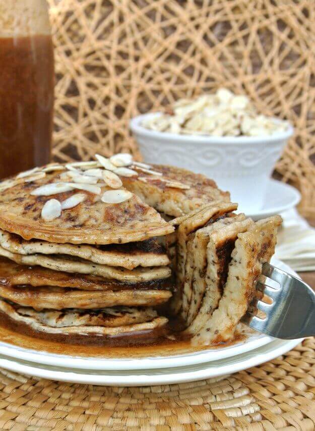 Vegan Buttermilk Pancakes with Almond Butter Maple Syrup are to-die-for and waiting for a great big bite. Have as a special treat on the weekends or serve at your holiday brunch.