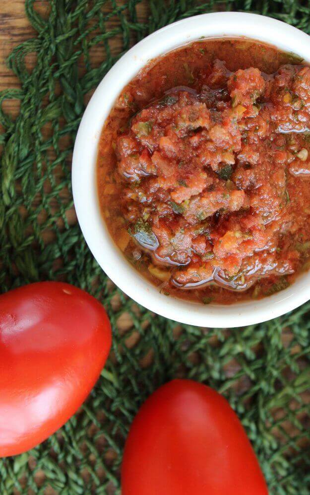 Slow Cooker Salsa with an overhead shot and fresh Roma tomatoes.