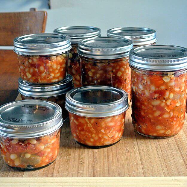Vegan White Bean Stew canned in ½ pints and full pints ready for the freezer.