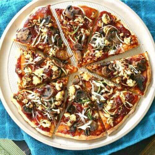 Vegan BBQ Veggie Pizza has all of the flavors and texture a person could want. So much healthier too!