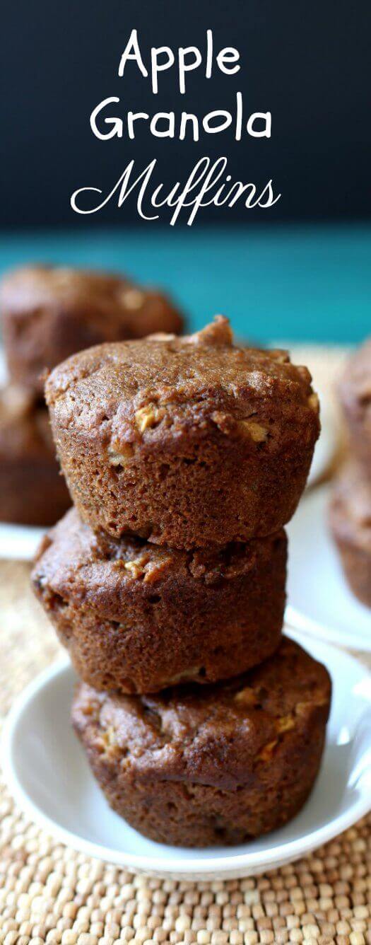 Apple Granola Muffins are deep golden stacked three high with a dark turquisse background.