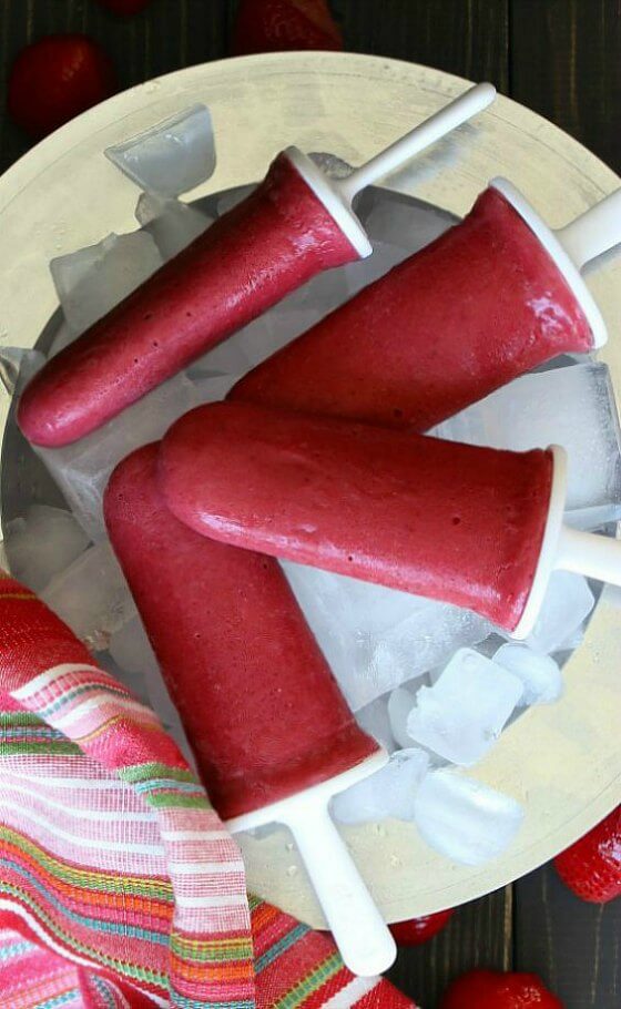 Dairy Free Strawberry Frozen Yogurt Popsicles only have three ingredients. They're fun to make, refreshing, mildly sweet, plant based, gluten free and easy.