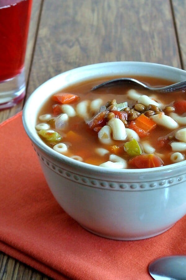 Easy Lentil Minestrone Soup is a little bit of a change-up from original minestrone soups in that it uses lentils instead of beans. The kids will love it.