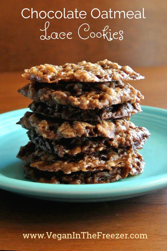 Chocolate Oatmeal Lace Cookies are stacked perfectly straight and seven cookies high on a turquoise plate. Lacey edges abound. Text is above and below the cookies for the title and blog page.