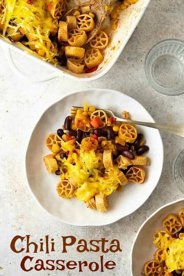 Chili Pasta showing Pasta wheels, kidney beans and vegan cheese piled high.