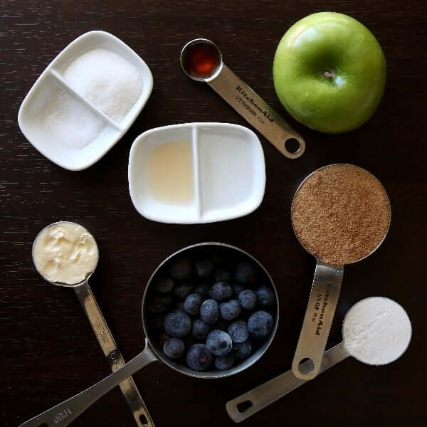 Overhead view of all of the ingredients for a half moon pie and each is in a container.