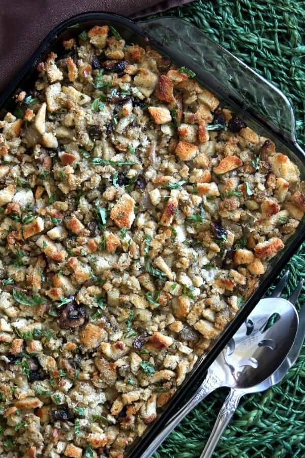 Overhead photo of a cropped vegan mushroom stuffing casserole just out of the oven.