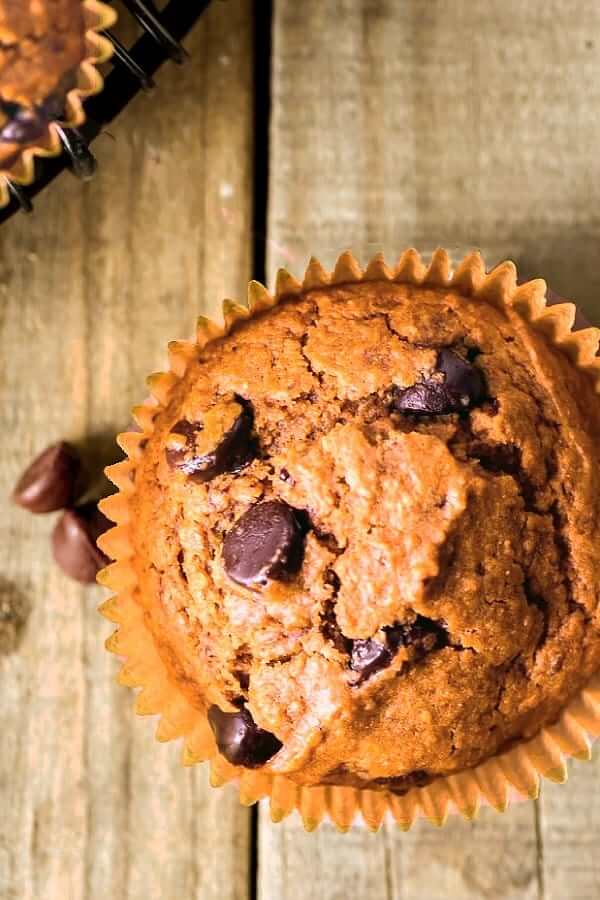 One overhead view of one muffin with chocolate chips showing through.