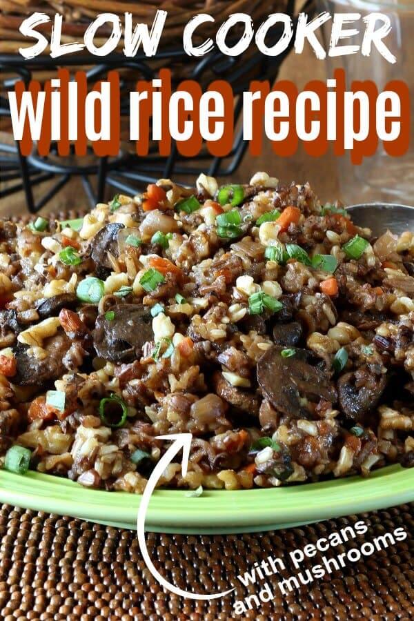 Front view of wild rice and veggies on a green plate and text above and below.