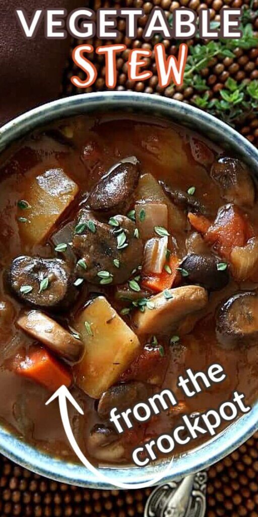 Overhead view of rich bown stew with mushrooms and veggies.