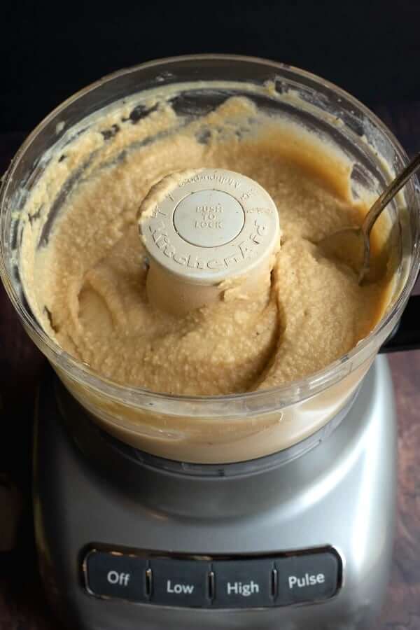 Food processor is filled with creamy chickpeas, garlic and more for a great dip.
