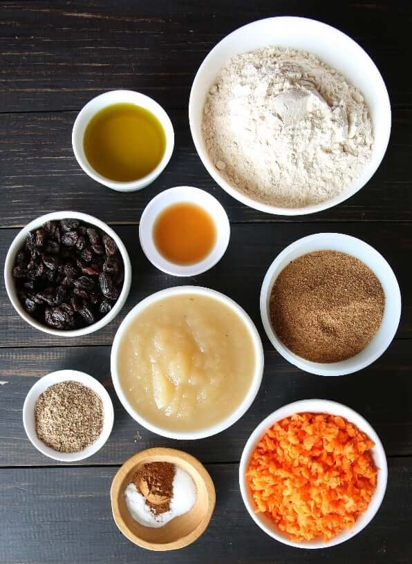 Overhead photo of each ingredient in it's own individually sized bowl for healthy carrot muffins.