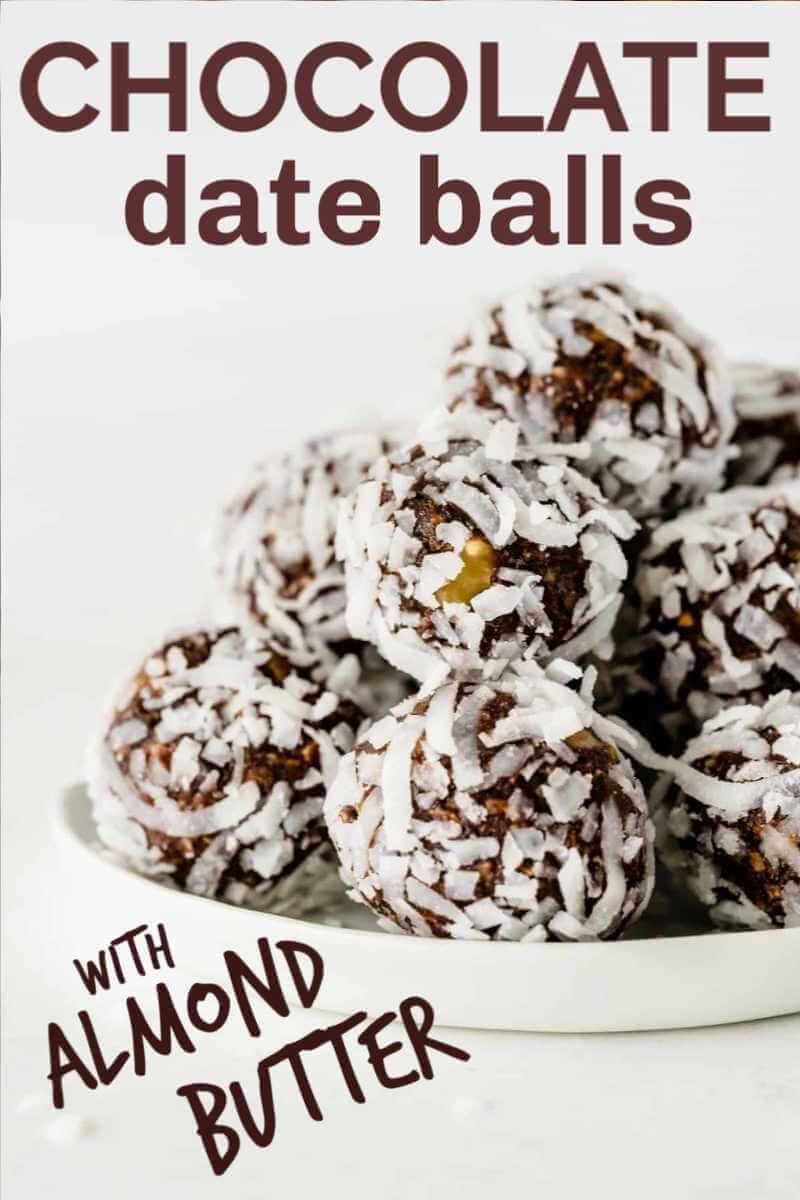 Cropped white plate full of coconut covered date balls with text for pinning.
