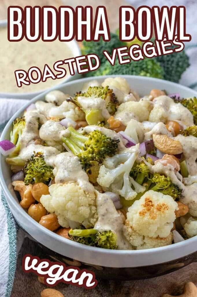 A buddha bowl full of roasted veggies and a creamy sauce pored over all. Text above for Pinterest.