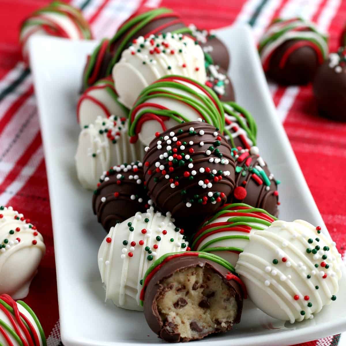 Colorful Christmas colors are the outer shell for easy vegan cookie dough truffles.