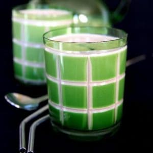 Green etched glass filled with a Vegan Baileys Irish Cream Whiskey.