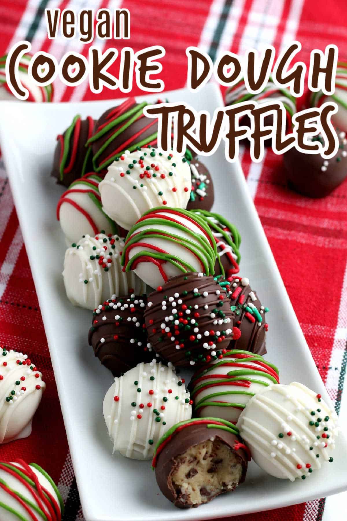 White plate piled high with festive colors of cookie dough truffles for the holidays.