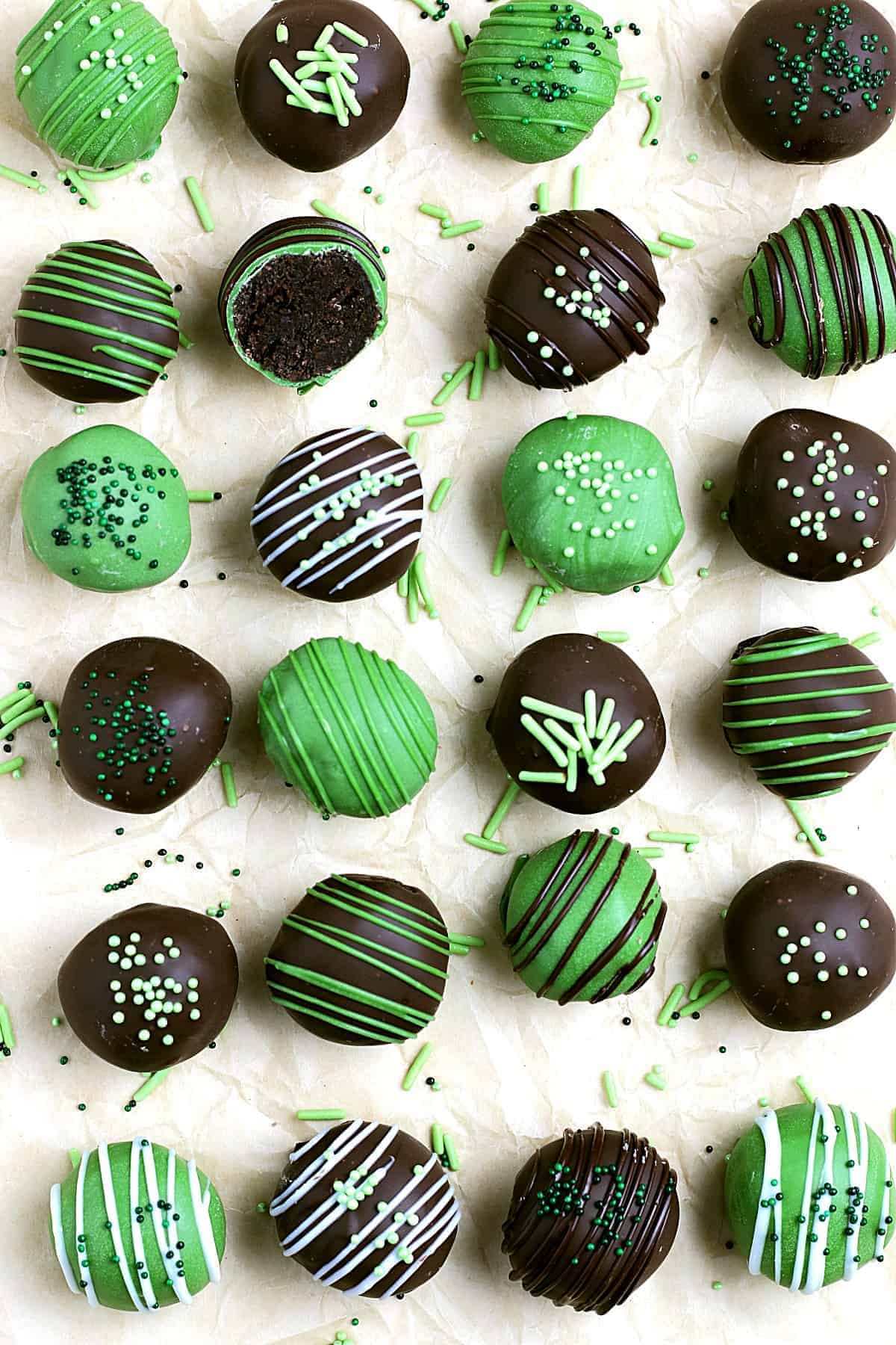 Overhead view of lined up mint cookie dough truffles candy.