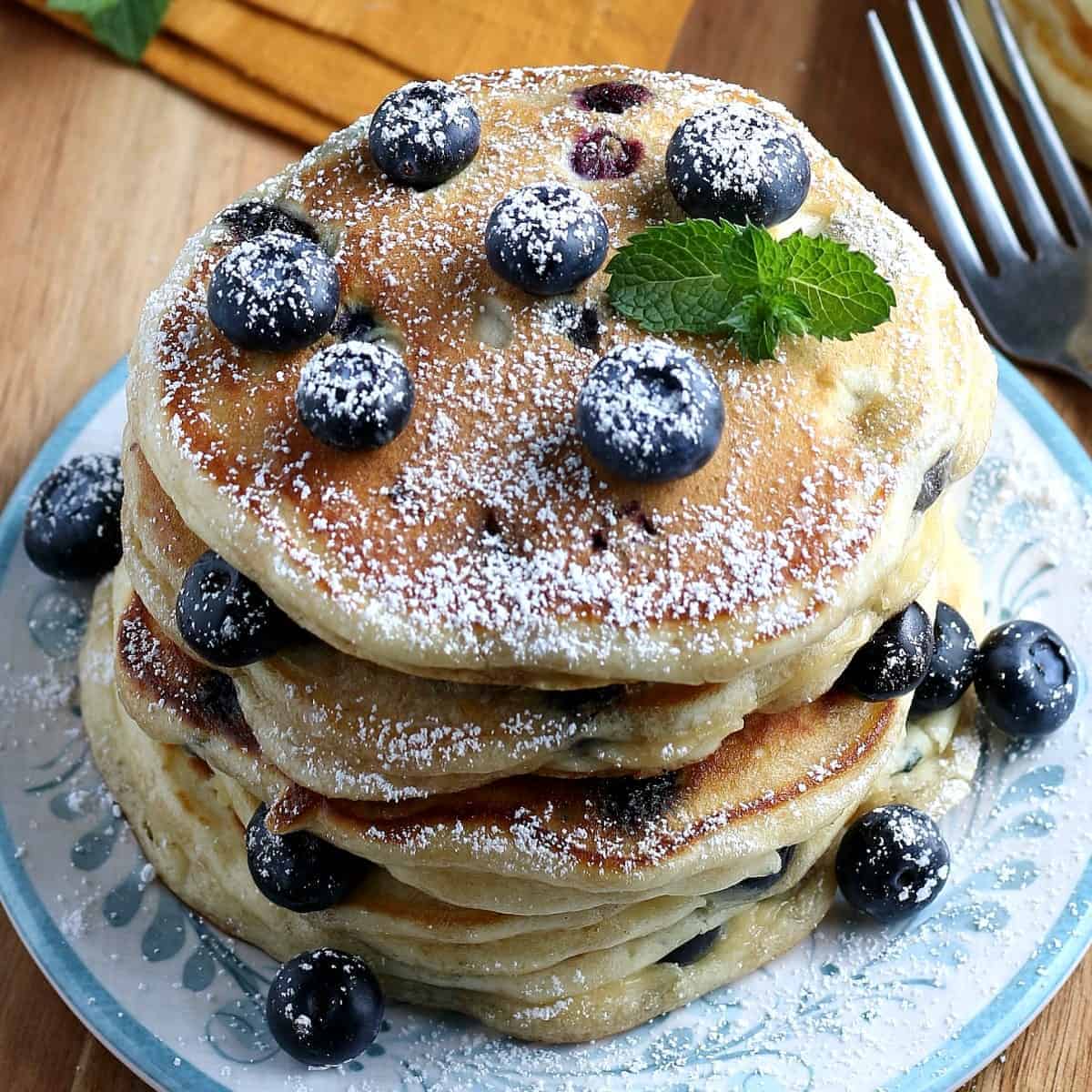 A stack of a vegan pancakes recipe cooked and sitting on a plate.