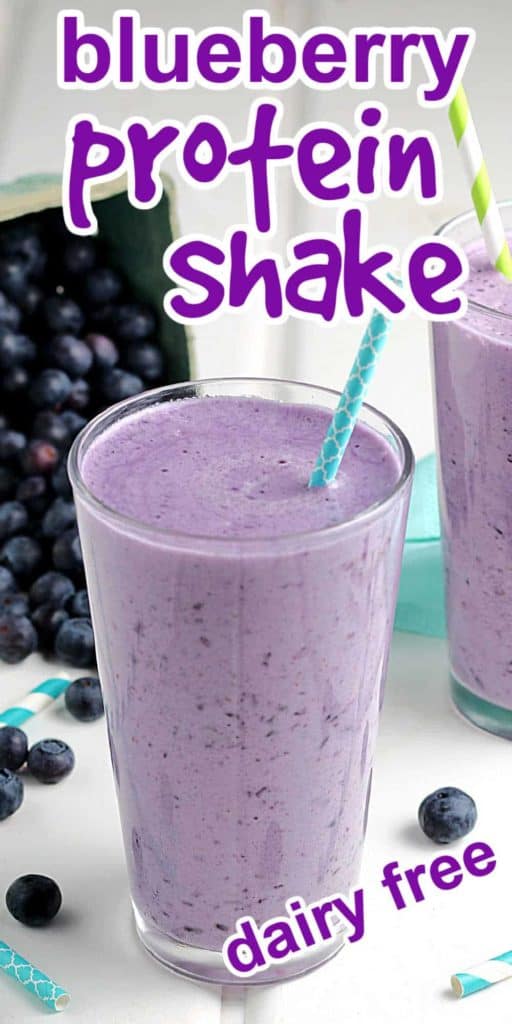 Lavender colored shake filling up a glass with a turquoise straw.