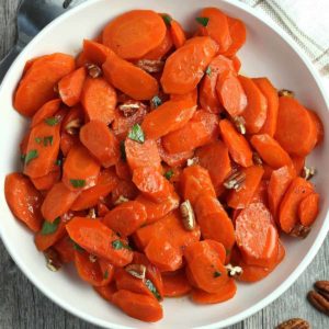 Close up of overhead view cooked glazed carrots.,