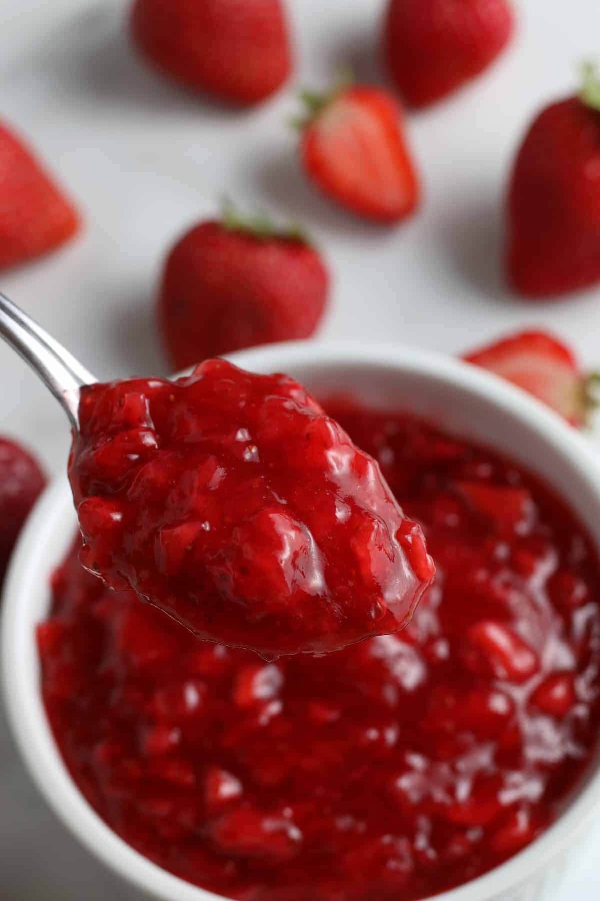 Close up of a spoonful of fruit topping.