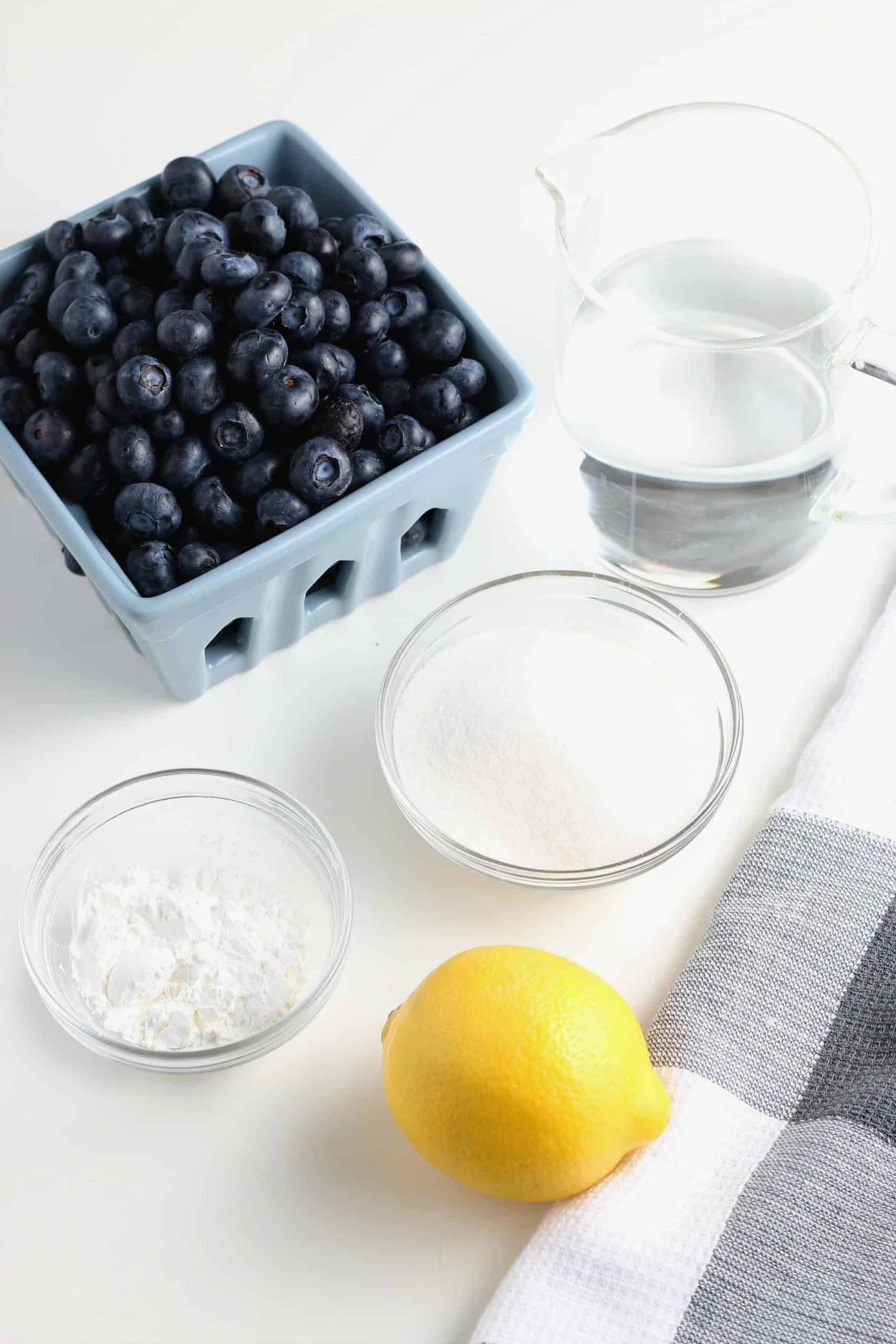 All of the 5 ingredients for a fruit topping.