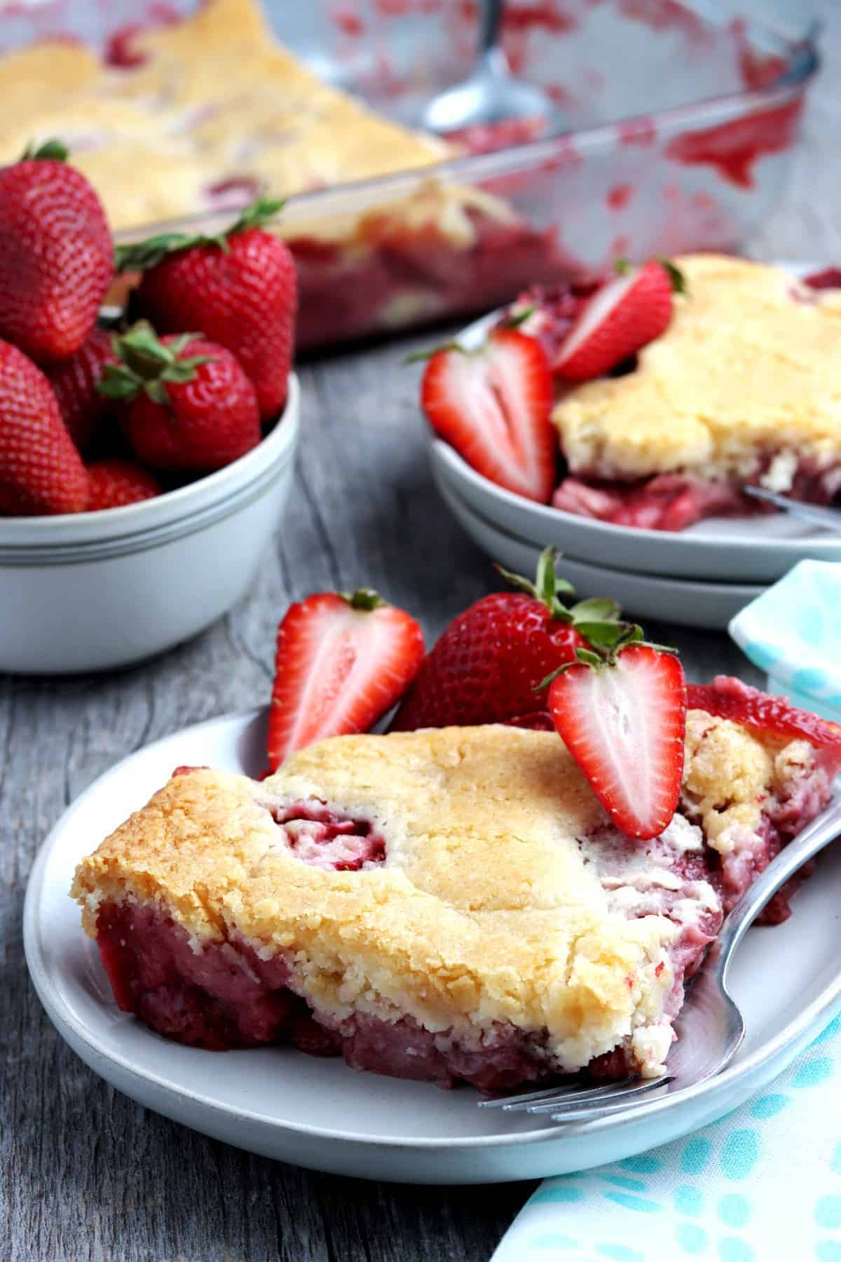 Dessert plate filled with a piece of pie with pie crust topping.