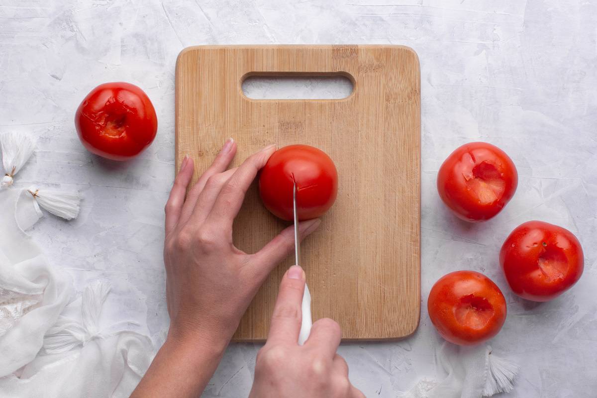 Make an X mark under each tomato