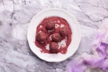 Roll truffles through strawberry powder to coat them well
