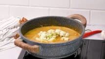 Add remaining 2 cups of cauliflower florets to the soup and simmer