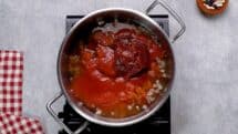Add vegetable broth dice tomatoes tomato sauce tomato paste and Worcestershire sauce