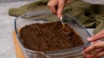 Take the date mixture and dab teaspoons full here and there across the bottom layer in the pan