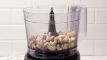 Drain the cashews and place in a food processor