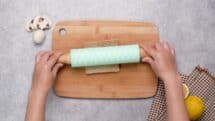 Roll each square thin with a rolling pin.