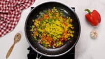 Heat the oil in a large skillet add onion and bell peppers all at once