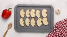 Lay out the Italian bread slices on a cookie sheet