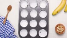 Lightly grease 12 muffin tins or use muffin cup liners
