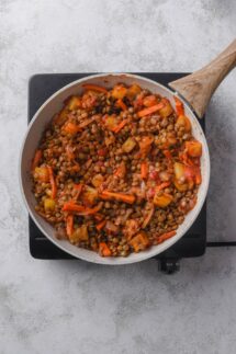 Then put in the cooked lentils and heat through