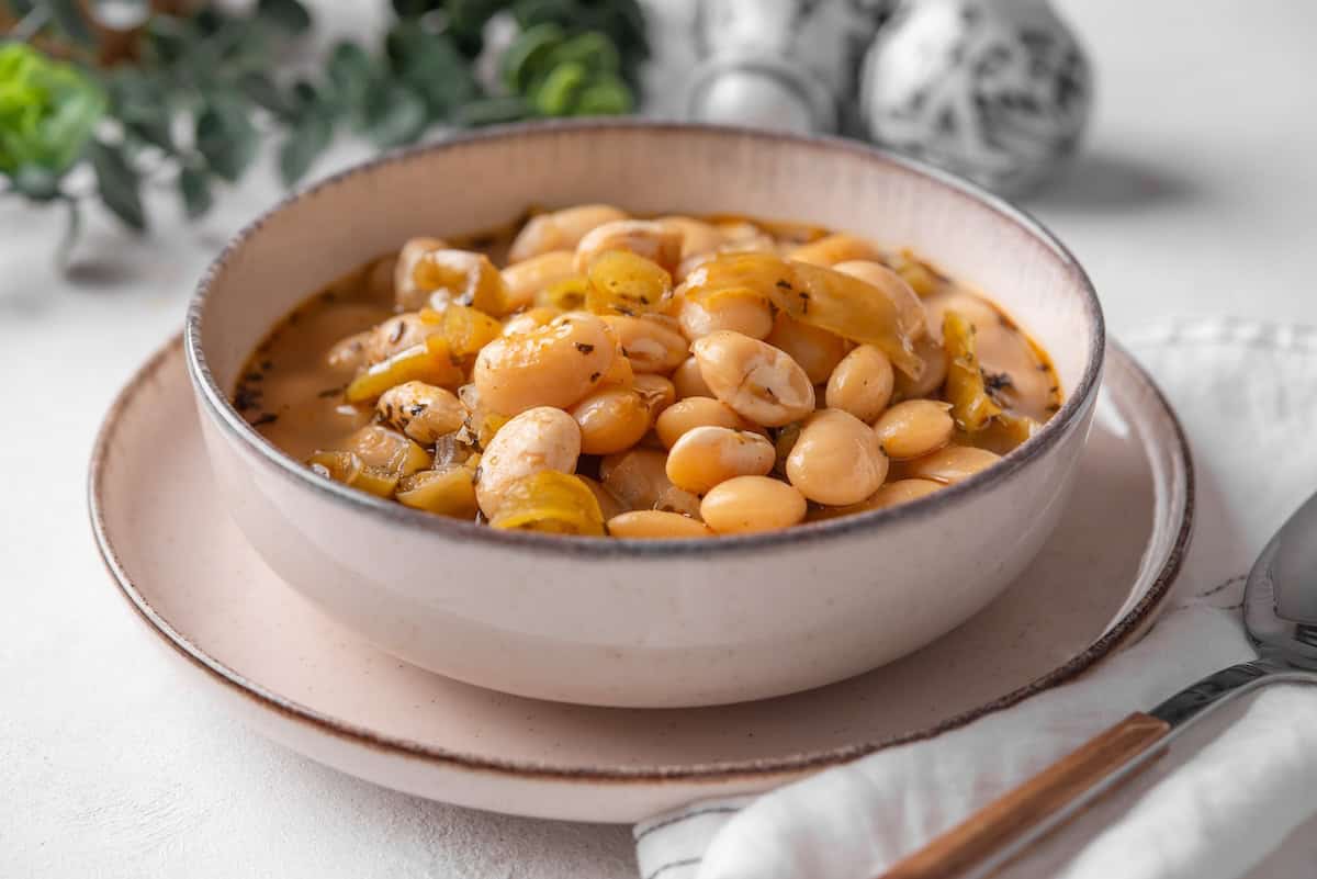slow cooker white bean chili served in a shallow bowl